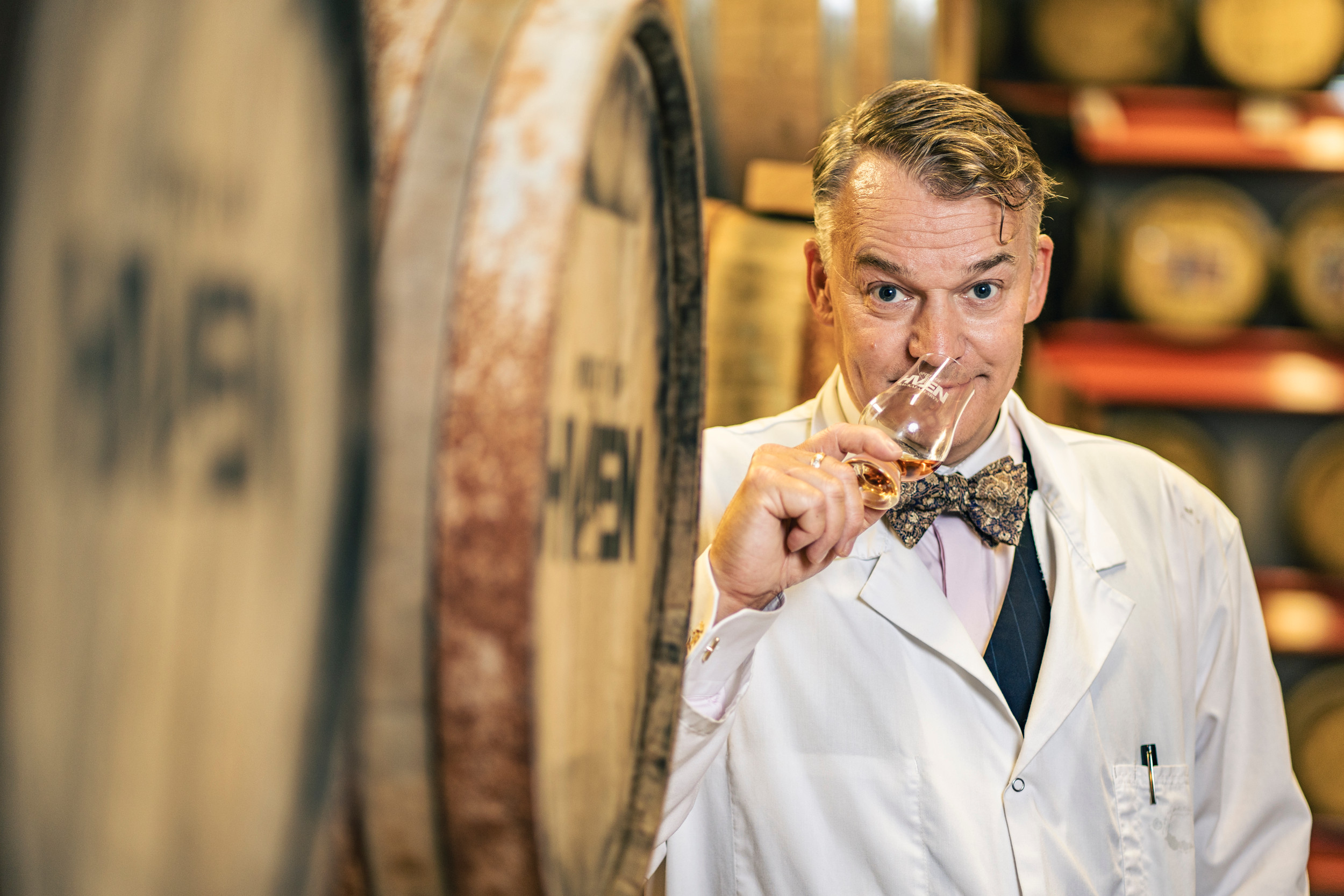 A man drinking whisky